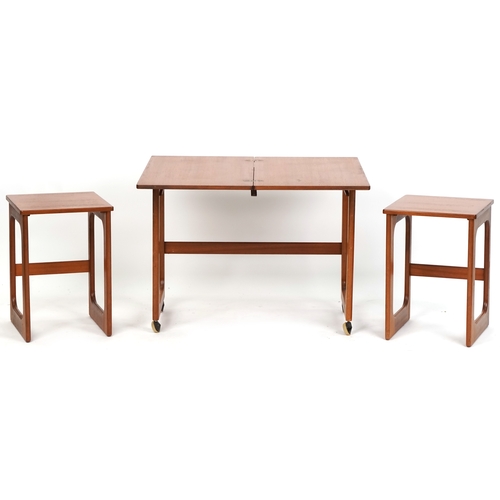 1073 - Nest of three mid 20th century teak occasional tables, H-59cm W-74cm D-41cm