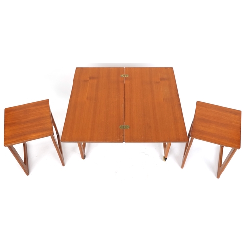 1073 - Nest of three mid 20th century teak occasional tables, H-59cm W-74cm D-41cm