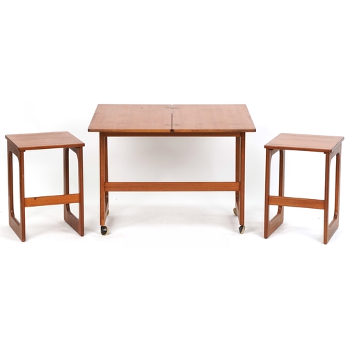 1073 - Nest of three mid 20th century teak occasional tables, H-59cm W-74cm D-41cm