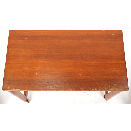 1073 - Nest of three mid 20th century teak occasional tables, H-59cm W-74cm D-41cm