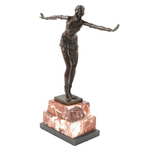 269 - Patinated bronze study of an Art Deco female dancer raised on a stepped marble base, 47cm high