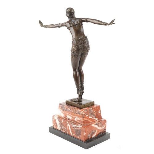 269 - Patinated bronze study of an Art Deco female dancer raised on a stepped marble base, 47cm high