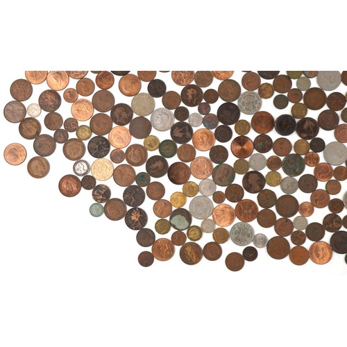 2179 - Large collection of antique and later British and world coinage including Victorian pennies, half cr... 