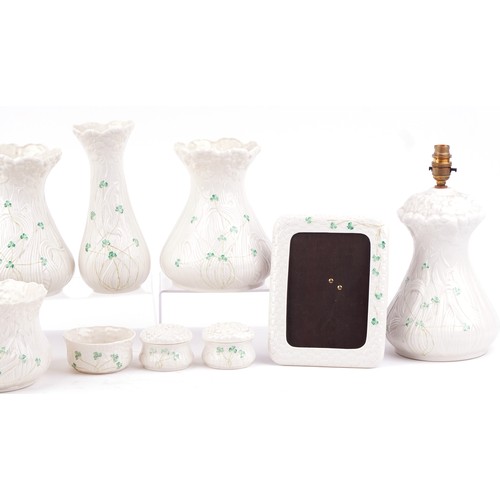 1410 - Bellek Irish porcelain including pair of lamps, vases, jardinière, the largest 34 cm high