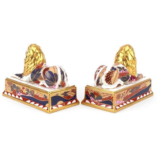  A pair of Royal Worcester Nelson Collection Trafalgar lions, limited edition 516/750, 15cm in length