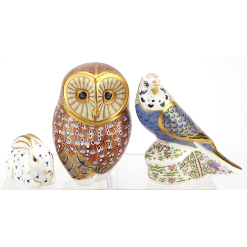 1173 - Seven Royal Crown Derby animal paperweights with stoppers comprising Violet Budgerigar, Owl, New Yea... 