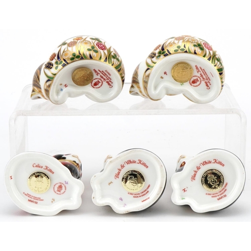 1172 - Five Royal Crown Derby cat paperweights with stoppers comprising 2 x Black & White Kittens, 2 x Cott... 