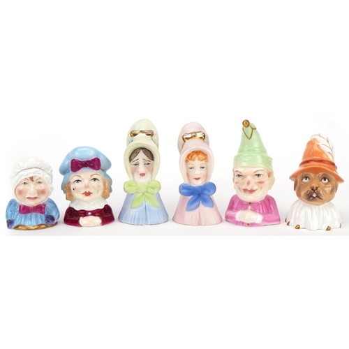 1175 - Six Royal Worcester candle snuffers including Old Lady, Baby, Punch and Judy, the largest 9.5cm high... 