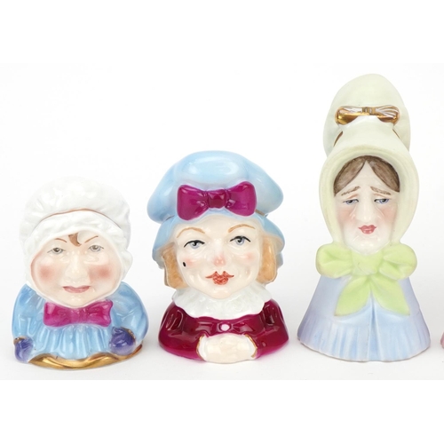 1175 - Six Royal Worcester candle snuffers including Old Lady, Baby, Punch and Judy, the largest 9.5cm high... 