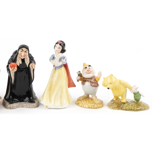 1194 - Royal Doulton collectables, some Disney, including Snow White, Lucifer and Winnie the Pooh, the larg... 