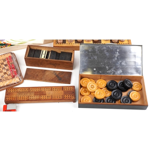 1290 - Vintage and later toys including Monopoly, Scrabble, bone and ebony Dominoes and travel chess sets.