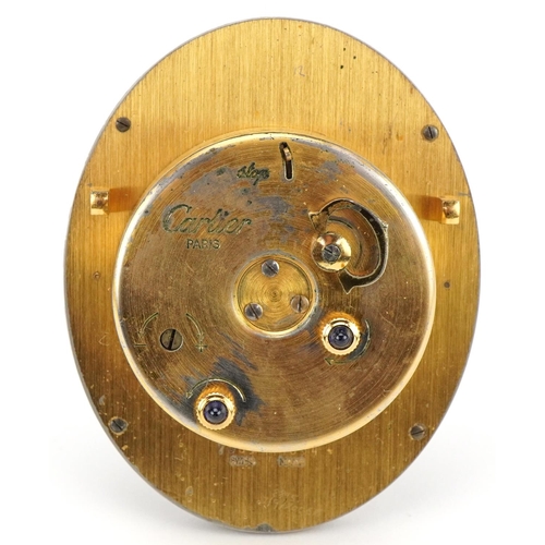  A Cartier enamelled strut clock with tooled leather Cartier box, numbered 7509 11534, 9cm high.