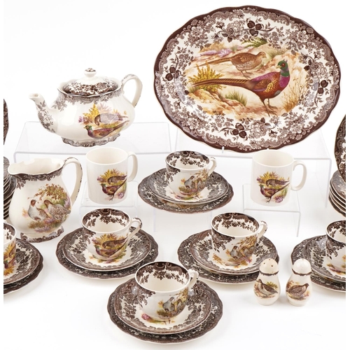 1243 - Palissy Game series dinner and teaware including teapot, dinner plates, trios and meat plate, the la... 