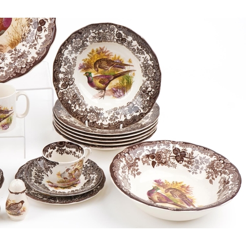 1243 - Palissy Game series dinner and teaware including teapot, dinner plates, trios and meat plate, the la... 