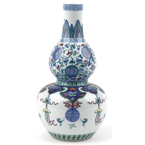 178 - A Chinese porcelain double gourd vase hand painted with flowers and objects, six figure character ma... 