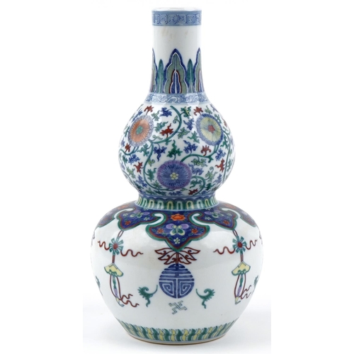 178 - A Chinese porcelain double gourd vase hand painted with flowers and objects, six figure character ma... 