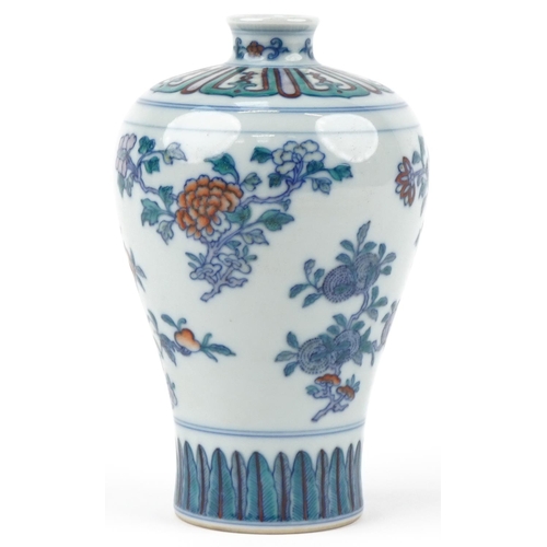 316 - A Chinese porcelain baluster vase hand painted with flowers, character marks to the base, 15cm high.