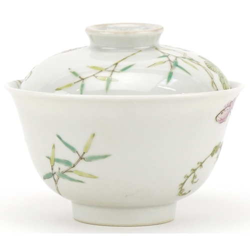 321 - A Chinese porcelain bowl and cover hand painted with fruiting vines, 9cm high x 11cm in diameter.