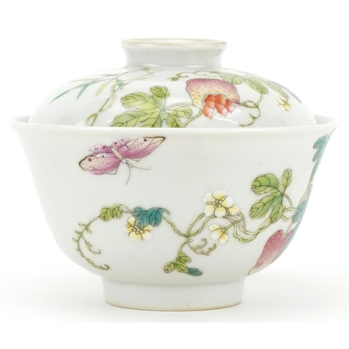 321 - A Chinese porcelain bowl and cover hand painted with fruiting vines, 9cm high x 11cm in diameter.