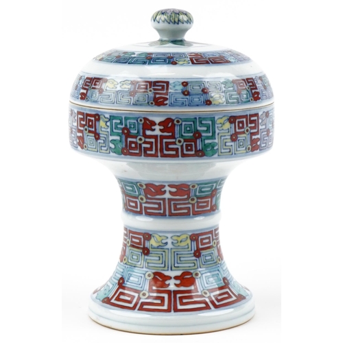 98 - A Chinese porcelain pedestal bowl and cover hand painted with geometric design, 24cm high.