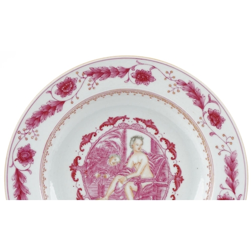 364 - A Chinese porcelain plate hand painted with a semi nude female amongst a floral border, 22.5cm in di... 