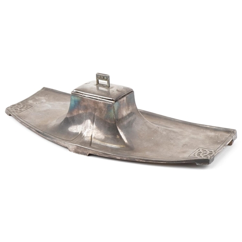 126A - WMF, a German Art Nouveau pewter inkwell with glass liner, 33cm wide.