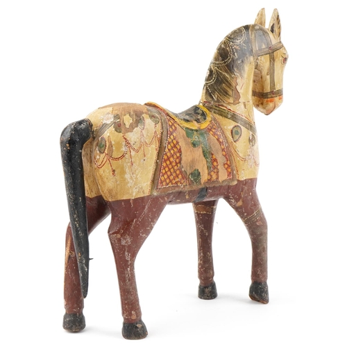 123 - Indian carved wood hand painted marriage horse, 39cm high.