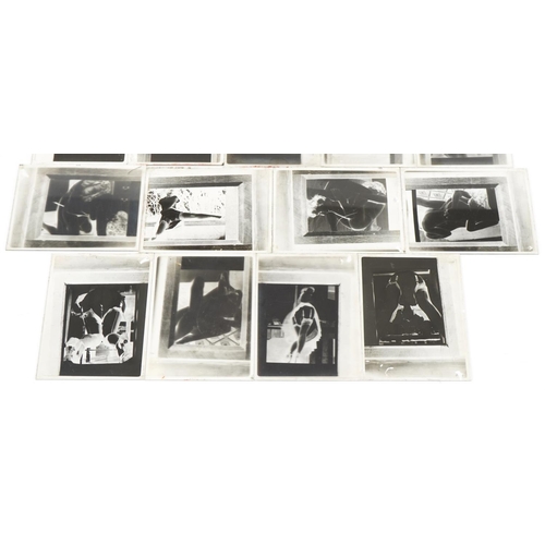 2290 - Collection of risqué black and white photographic slides of females housed in an Ilford box.