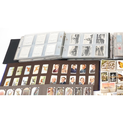 2326 - An extensive collection of early 20th century and later cigarette cards, tea cards and trade cards, ... 