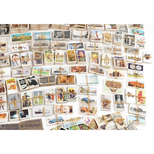 2326 - An extensive collection of early 20th century and later cigarette cards, tea cards and trade cards, ... 