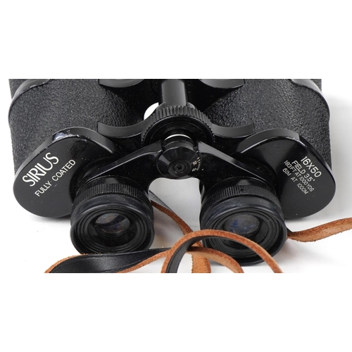 530 - Three pairs of binoculars with cases comprising Sirius 16 x 50, Panther 7 x 35 WA and Halina Sightse... 