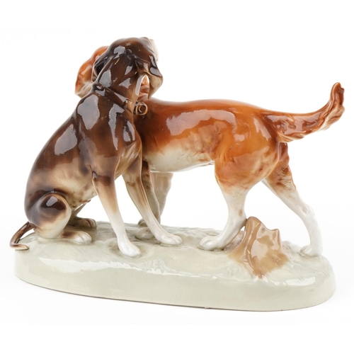 1213 - Royal Dux, a Czechoslovakian large porcelain study of two pointer dogs, 38cm in length.