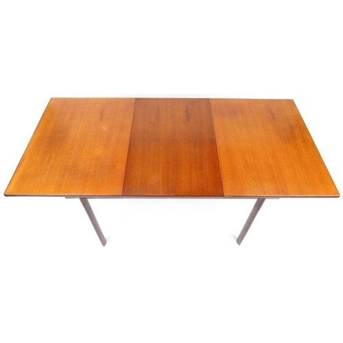 1010 - A mid/late 20th century teak extending dining table by White & Newton Ltd, Portsmouth, 72cm high x 1... 