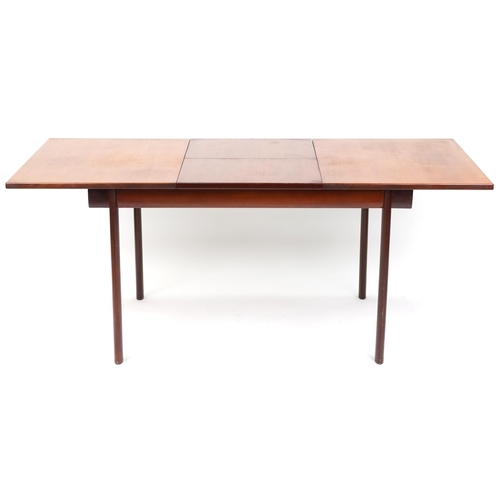 1010 - A mid/late 20th century teak extending dining table by White & Newton Ltd, Portsmouth, 72cm high x 1... 