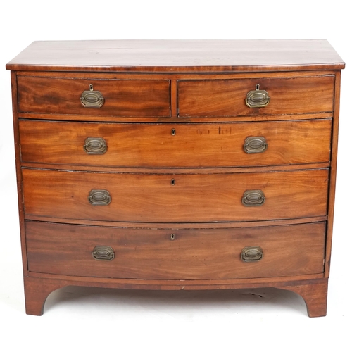 1003 - A George III mahogany bow front chest of two short and three long drawers on bracket feet, 97cm H x ... 