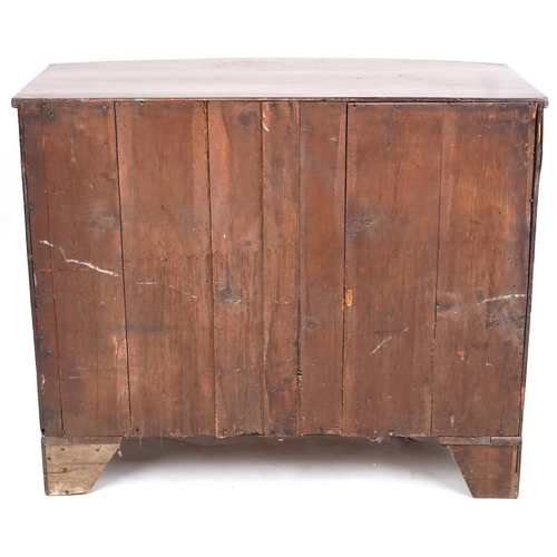 1003 - A George III mahogany bow front chest of two short and three long drawers on bracket feet, 97cm H x ... 