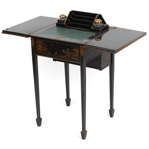 1001 - An Edwardian black chinoiserie lacquered metamorphic writing table, the double hinged lid revealing ... 