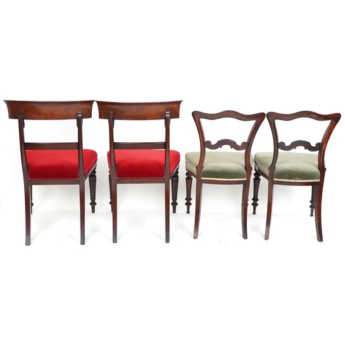 1124 - A pair of mid Victorian rosewood spoon back dining chairs raised on turned and fluted legs together ... 