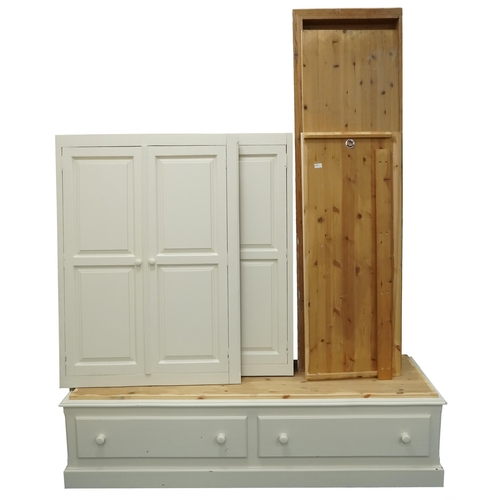 1126 - A modern white painted pine four section wardrobe (dismantled).