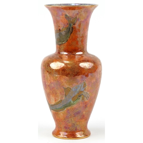 21 - An A. G. Harley-Jones for Wilton Ware orange lustre vase decorated with fish, bearing marks to the b... 