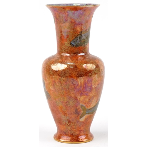 21 - An A. G. Harley-Jones for Wilton Ware orange lustre vase decorated with fish, bearing marks to the b... 