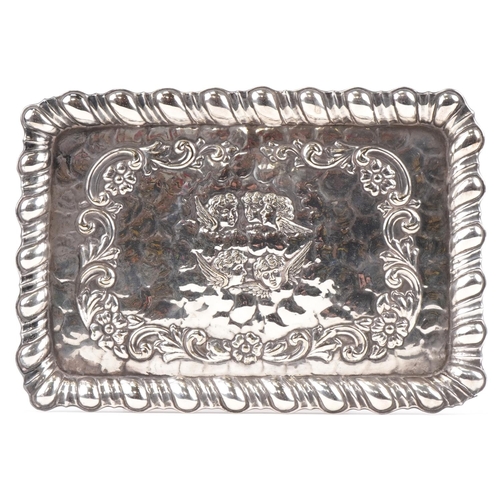 397 - A Victorian rectangular silver plated dressing table tray decorated with cherubs within a gadrooned ... 