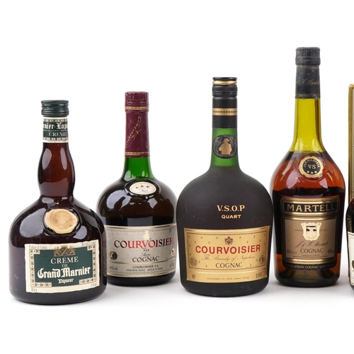 564 - Ten bottles of cognac and liqueur including Courvoisier, Martell, Grand Marnier and Drambuie.