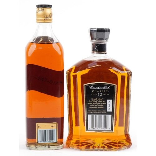 557 - Two bottles of whisky comprising Johnnie Walker Black Label 12 Year Extra Special Old Scotch whisky ... 