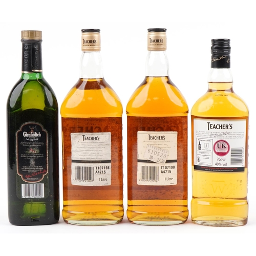 560 - Three bottles of Teacher's Scotch whisky and a bottle of Glenfiddich Pure Malt Scotch whisky