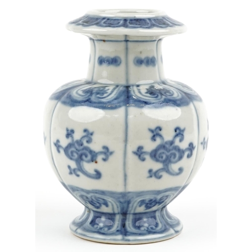 100 - A Chinese blue and white porcelain hand painted vase, 18cm high.