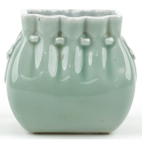 46 - A Chinese porcelain celadon glazed vase in the form of coin purse, 10cm high.