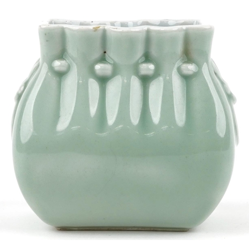 46 - A Chinese porcelain celadon glazed vase in the form of coin purse, 10cm high.