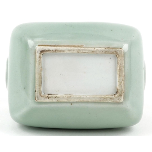 46 - A Chinese porcelain celadon glazed vase in the form of coin purse, 10cm high.