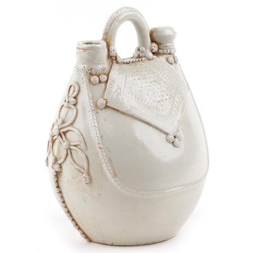 48 - A Chinese porcelain cream glazed water vessel in the form of a bag, 27cm high.